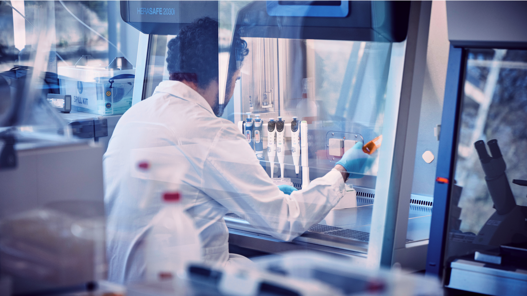 Scientist working in a high-end laboratory.